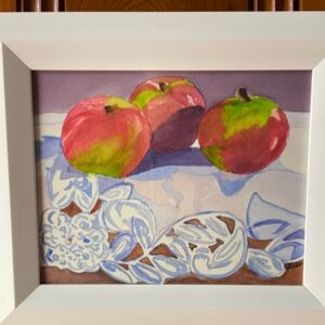 Painting of apples on a laced tablecloth